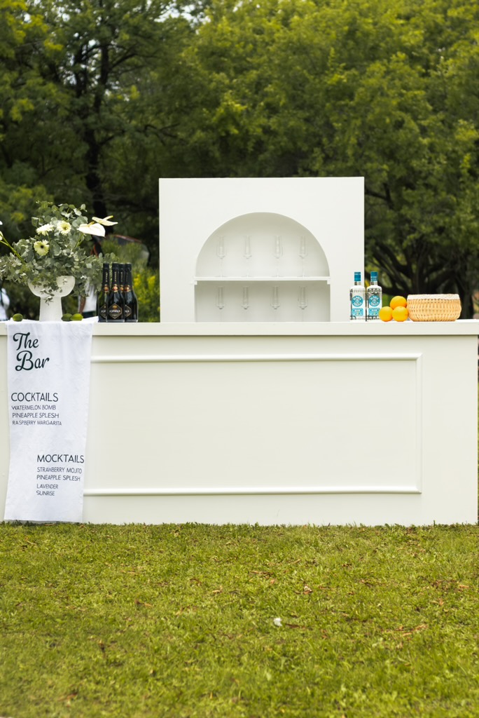 Styled mobile bar cart with cocktail and mocktail menu